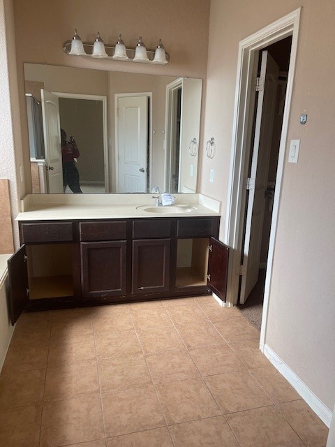 21418 Forest Colony Drive Porter, TX 77365 - Photo 12 of 21 a bathroom with a sink vanity and mirror