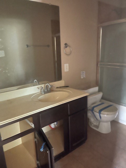 21418 Forest Colony Drive Porter, TX 77365 - Photo 13 of 21 a bathroom with a sink a toilet and a mirror
