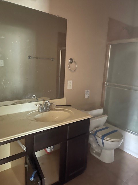 21418 Forest Colony Drive Porter, TX 77365 - Photo 15 of 21 a bathroom with a sink a toilet a mirror and shower