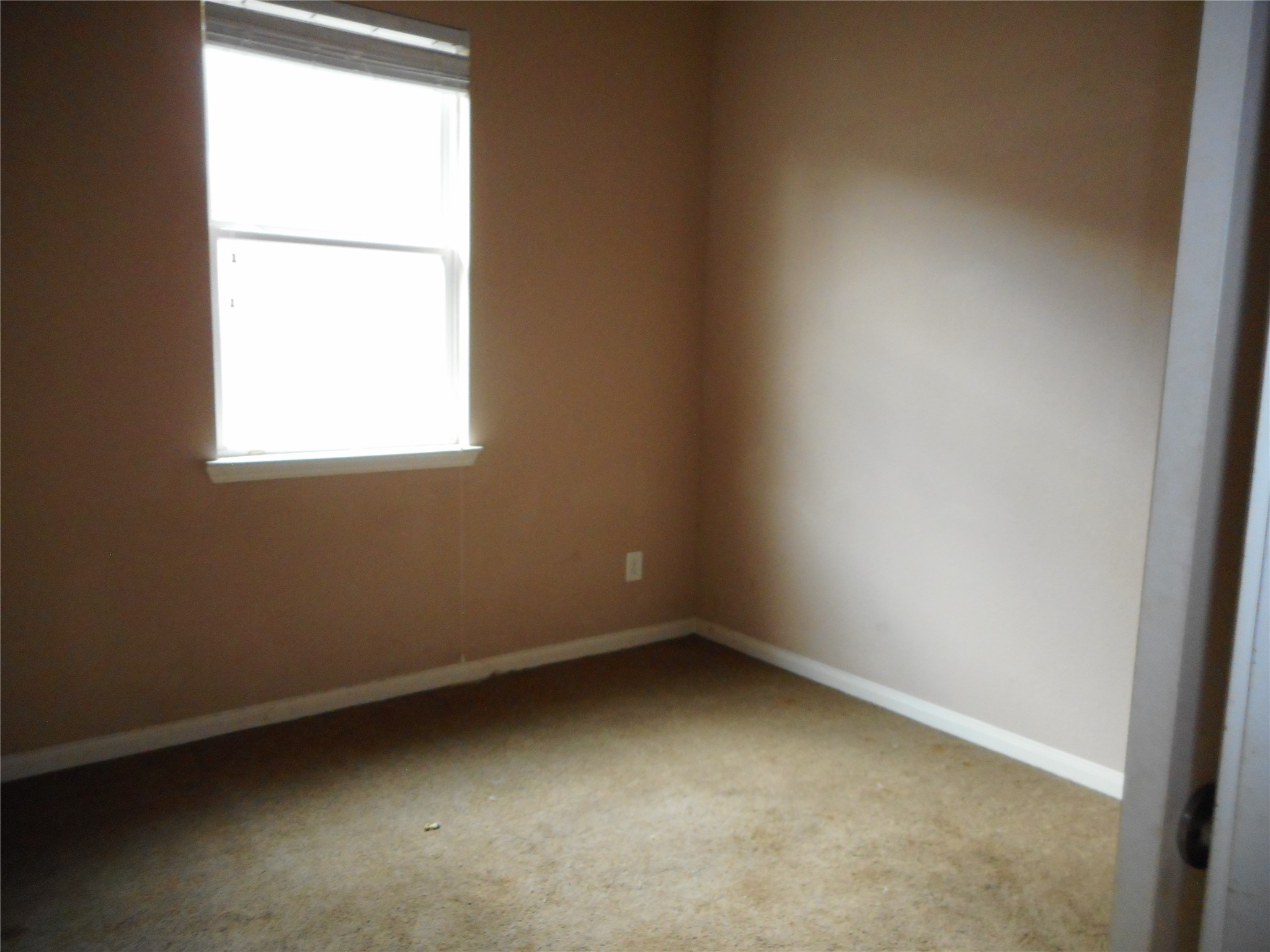 21418 Forest Colony Drive Porter, TX 77365 - Photo 2 of 21 an empty room with a window