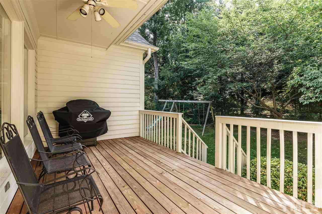 2621 Ridgewell Court Raleigh, NC 27613 - Photo 22 of 25 a view of a balcony with wooden floor