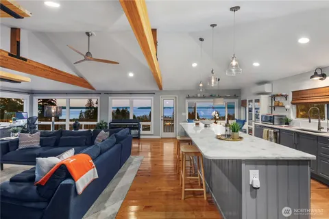 a view of a kitchen and dining room