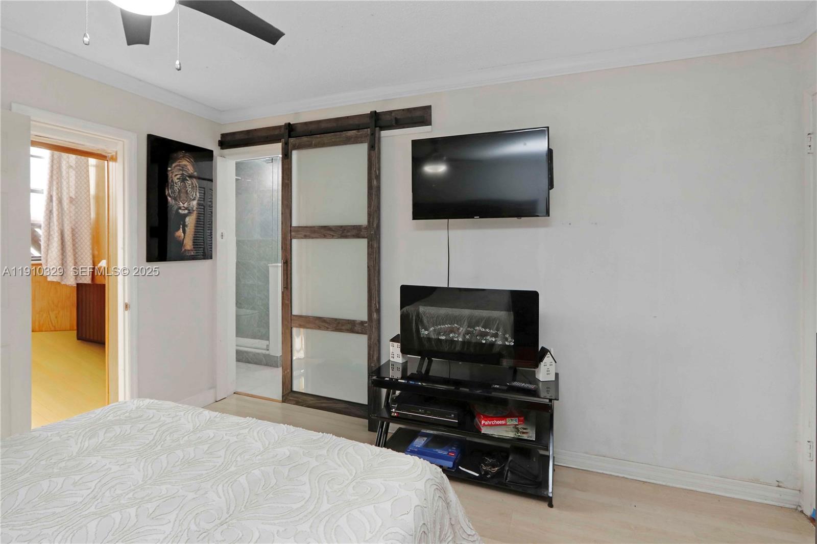 12305 Southwest 94th Terrace Miami, FL 33186 - Photo 15 of 29 a living room with furniture and a flat screen tv