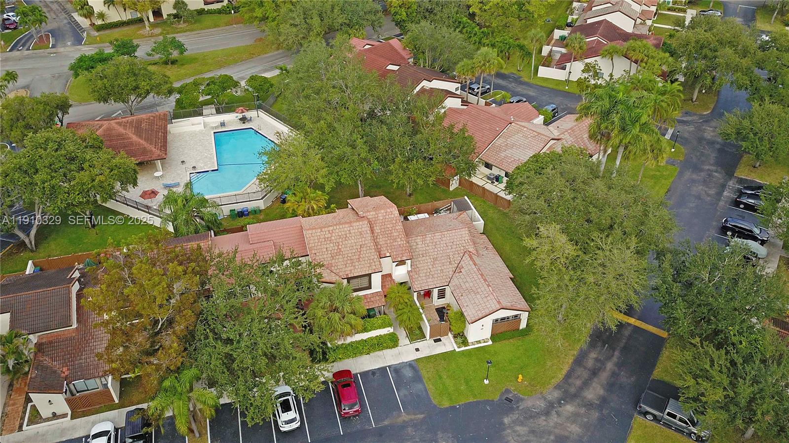 12305 Southwest 94th Terrace Miami, FL 33186 - Photo 18 of 29 an aerial view of a house with a garden and trees