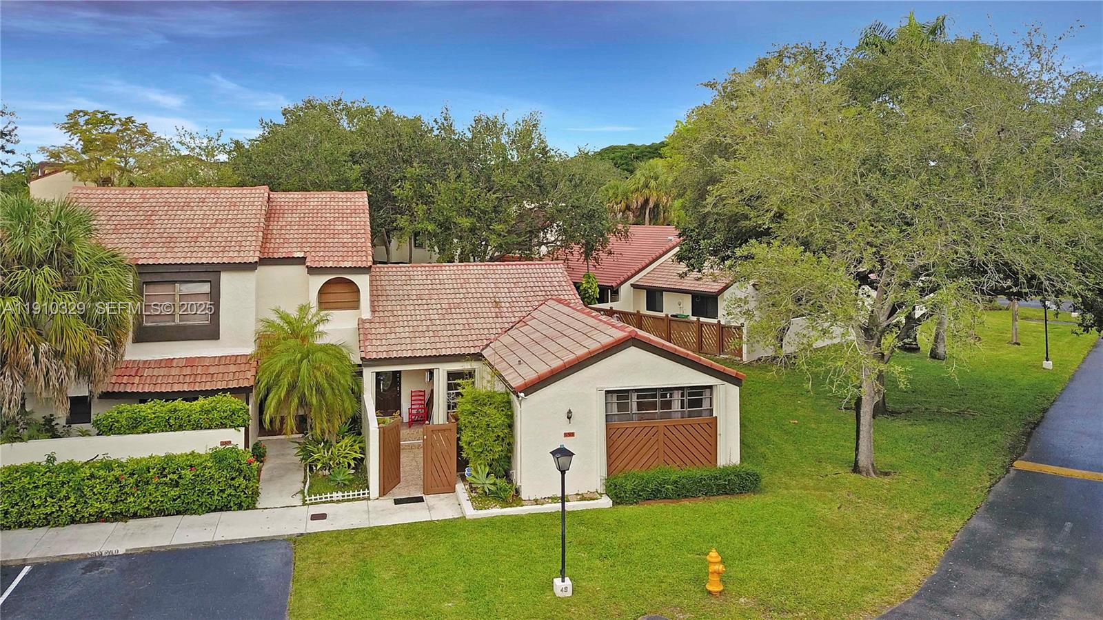 12305 Southwest 94th Terrace Miami, FL 33186 - Photo 21 of 29 front view of a house with a yard