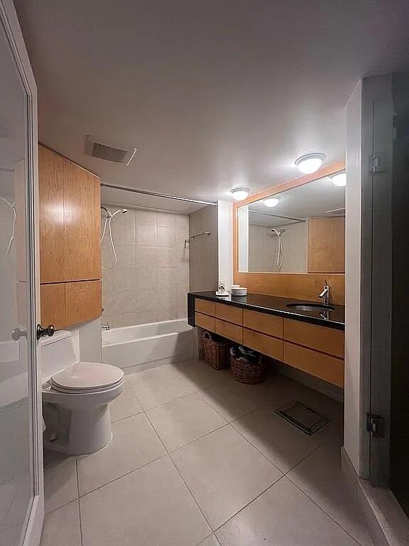6463 La Costa Drive, Unit 105 Boca Raton, FL 33433 - Photo 25 of 40 a bathroom with a sink a toilet and shower