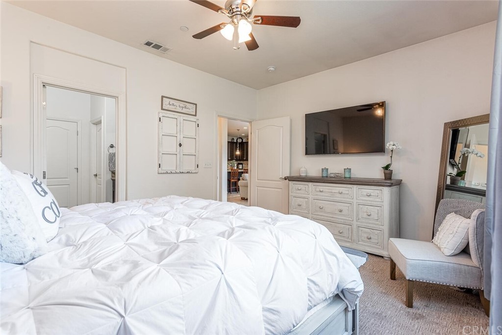 1039 Ford Drive Nipomo, CA 93444 - Photo 16 of 45 a bedroom with a bed and a flat screen tv