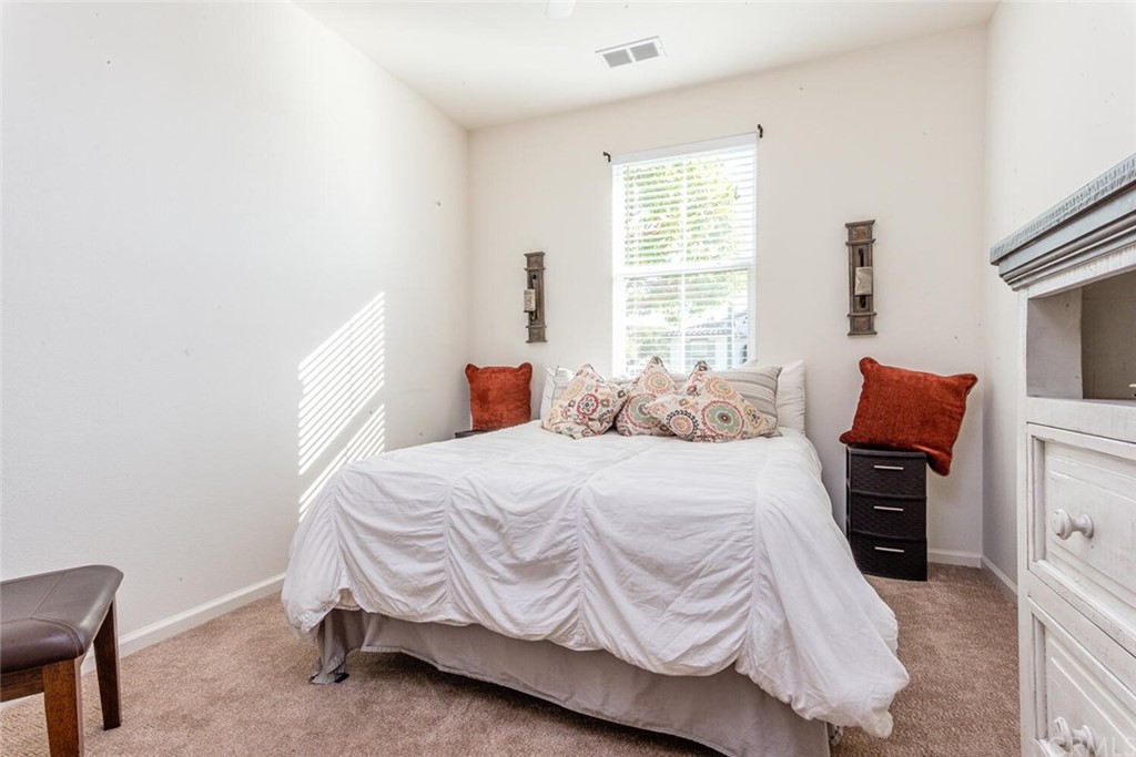 1039 Ford Drive Nipomo, CA 93444 - Photo 20 of 45 a bedroom with a bed and a window