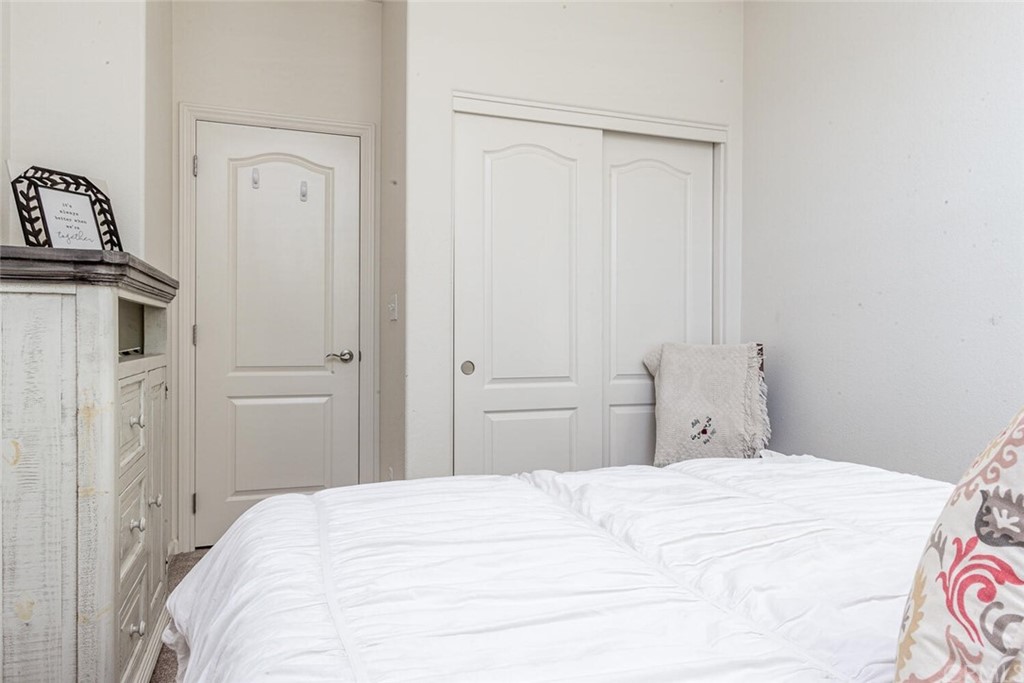 1039 Ford Drive Nipomo, CA 93444 - Photo 21 of 45 a bedroom with a bed and a cabinets