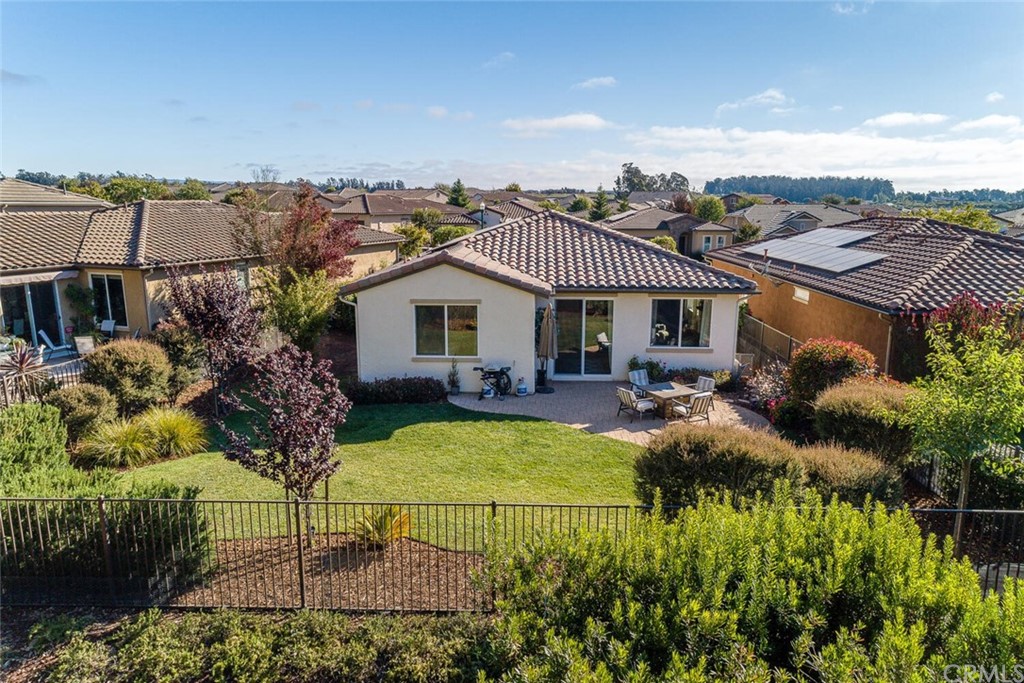 1039 Ford Drive Nipomo, CA 93444 - Photo 26 of 45 a view of a house with backyard and sitting area