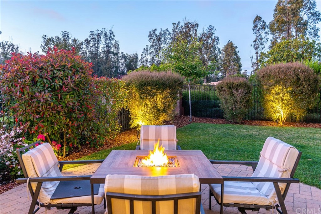1039 Ford Drive Nipomo, CA 93444 - Photo 3 of 45 a view of a chairs and table in backyard of the house