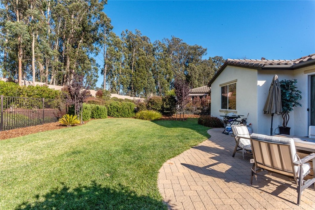1039 Ford Drive Nipomo, CA 93444 - Photo 31 of 45 a view of a house with backyard and sitting area