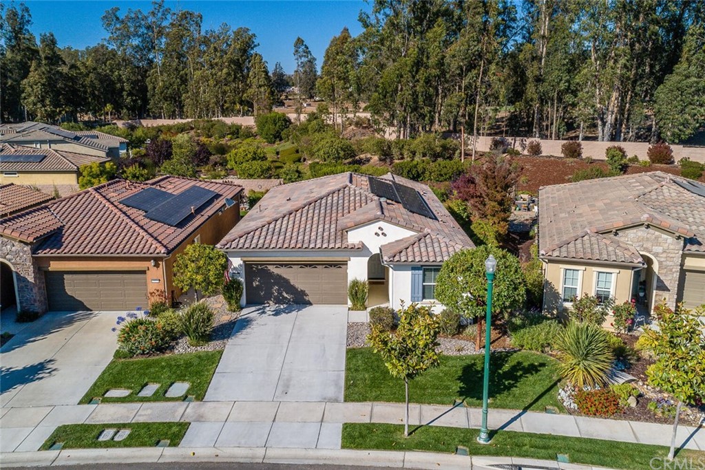 1039 Ford Drive Nipomo, CA 93444 - Photo 5 of 45 a front view of a house with a garden