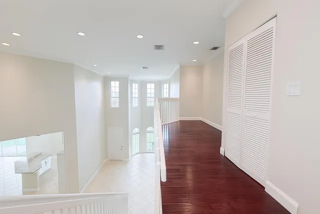 a view of entryway with wooden floor