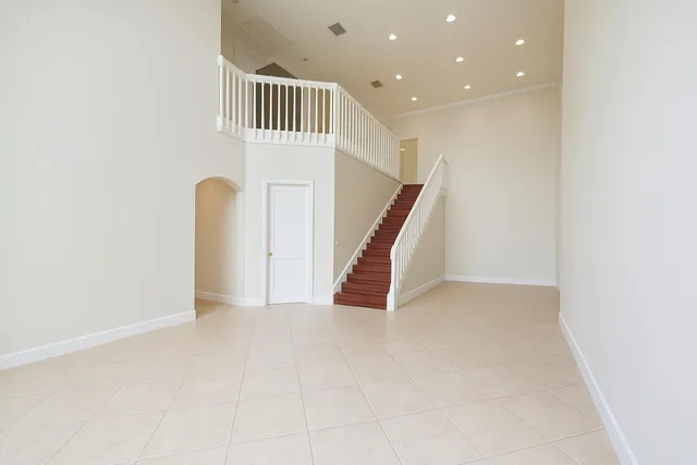 a view of an entryway with stairs