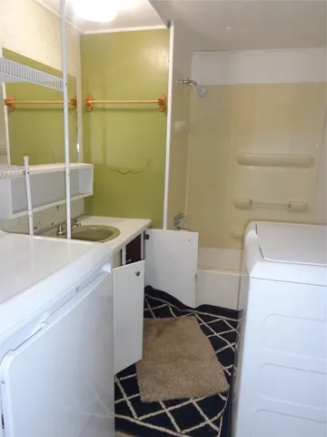 a bathroom with a sink and a toilet