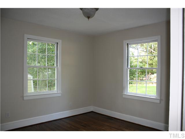 901 North State Street Raleigh, NC 27604 - Photo 10 of 21 This home has three good sized bedrooms which all have the same color combination as the living room and dining room. The master has two large windows. One with a view of the large backyard.