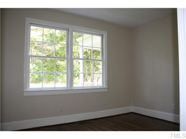 901 North State Street Raleigh, NC 27604 - Photo 12 of 21 The second of the three bedrooms has a double window that lets in plenty of light. It has a standard size closet.