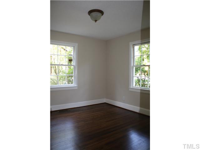 901 North State Street Raleigh, NC 27604 - Photo 14 of 21 The third bedroom is a little bit larger than the second bedroom and has two nice size windows and a standard size closet.