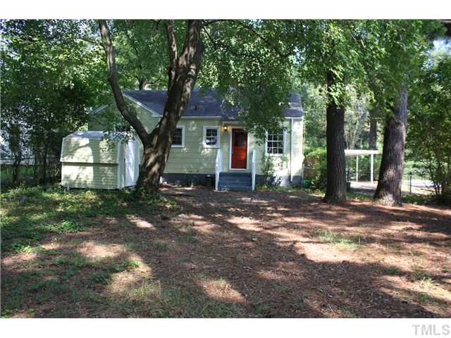 901 North State Street Raleigh, NC 27604 - Photo 17 of 21 The back yard is quite large and is completely fenced. There is plenty of room to garden! This home also has covered parking with a one car white carport.