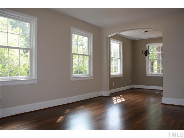 901 North State Street Raleigh, NC 27604 - Photo 21 of 21 This home gets plenty of light through the four large windows in the living room / dining room combination. This open floorplan makes it easy to entertain!