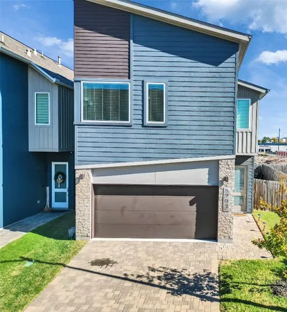 a front view of a house with yard