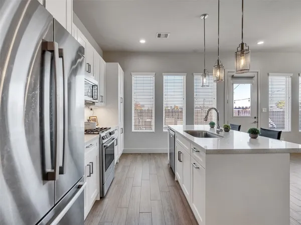 a bedroom with a bed furniture and a window