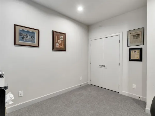 a view of a chairs with wooden fence