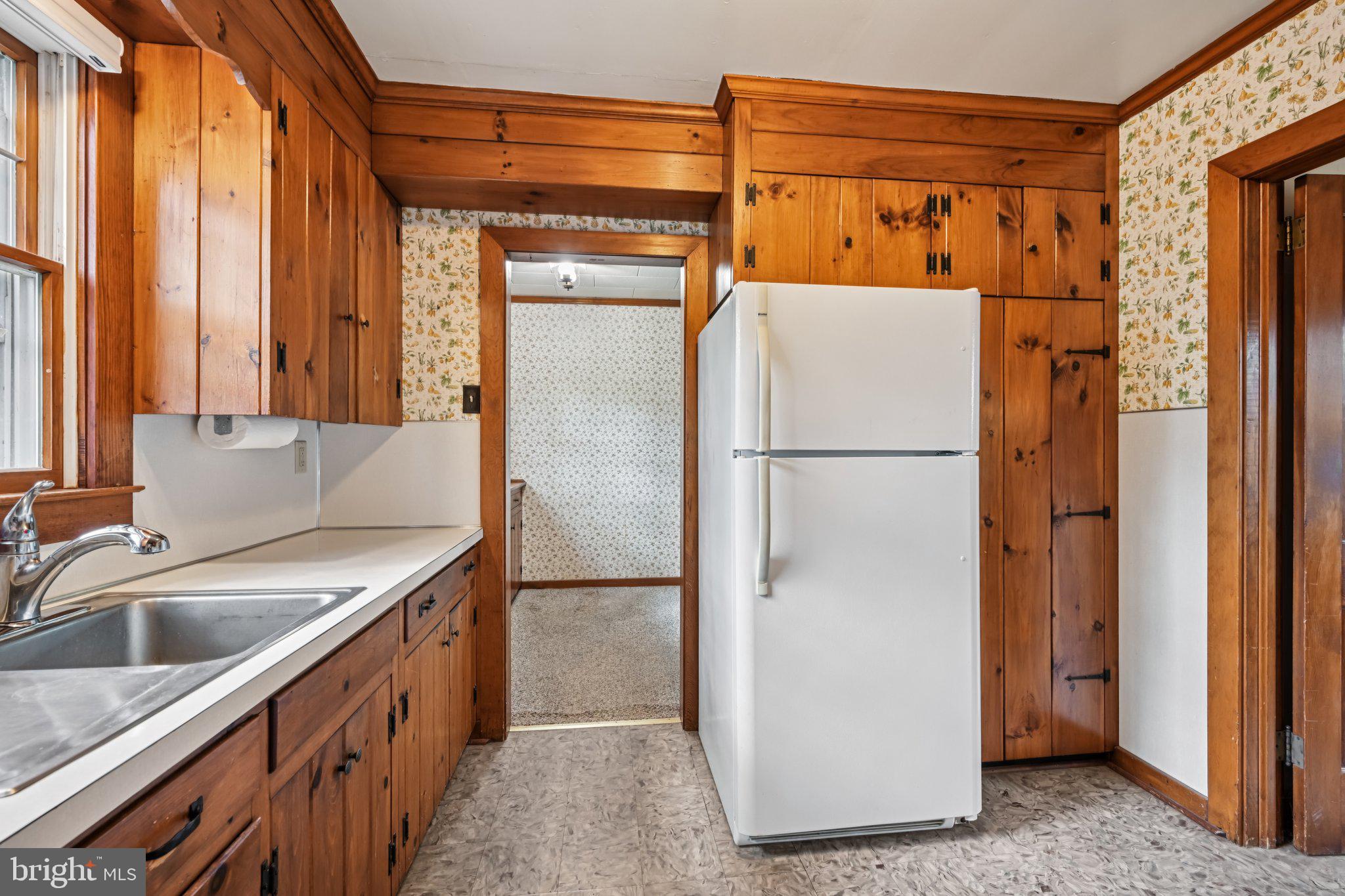 60 Brownback Road Royersford, PA 19468 - Photo 18 of 50 a kitchen with a refrigerator and a sink