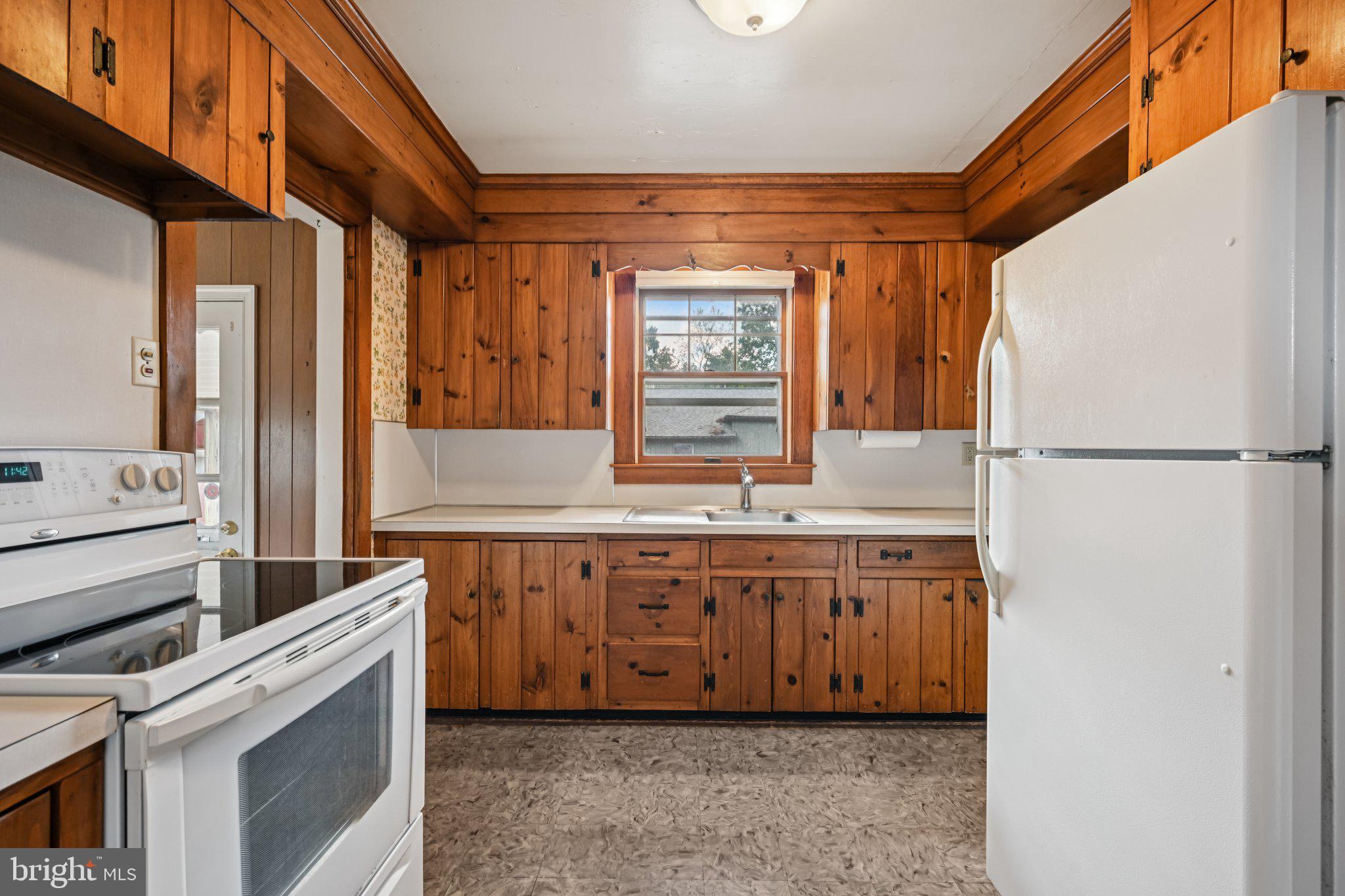 60 Brownback Road Royersford, PA 19468 - Photo 19 of 50 a kitchen with a sink and a refrigerator
