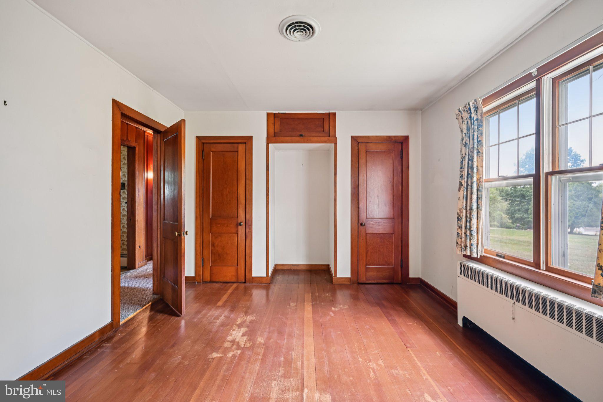 60 Brownback Road Royersford, PA 19468 - Photo 31 of 50 a view of empty room with wooden floor and fan