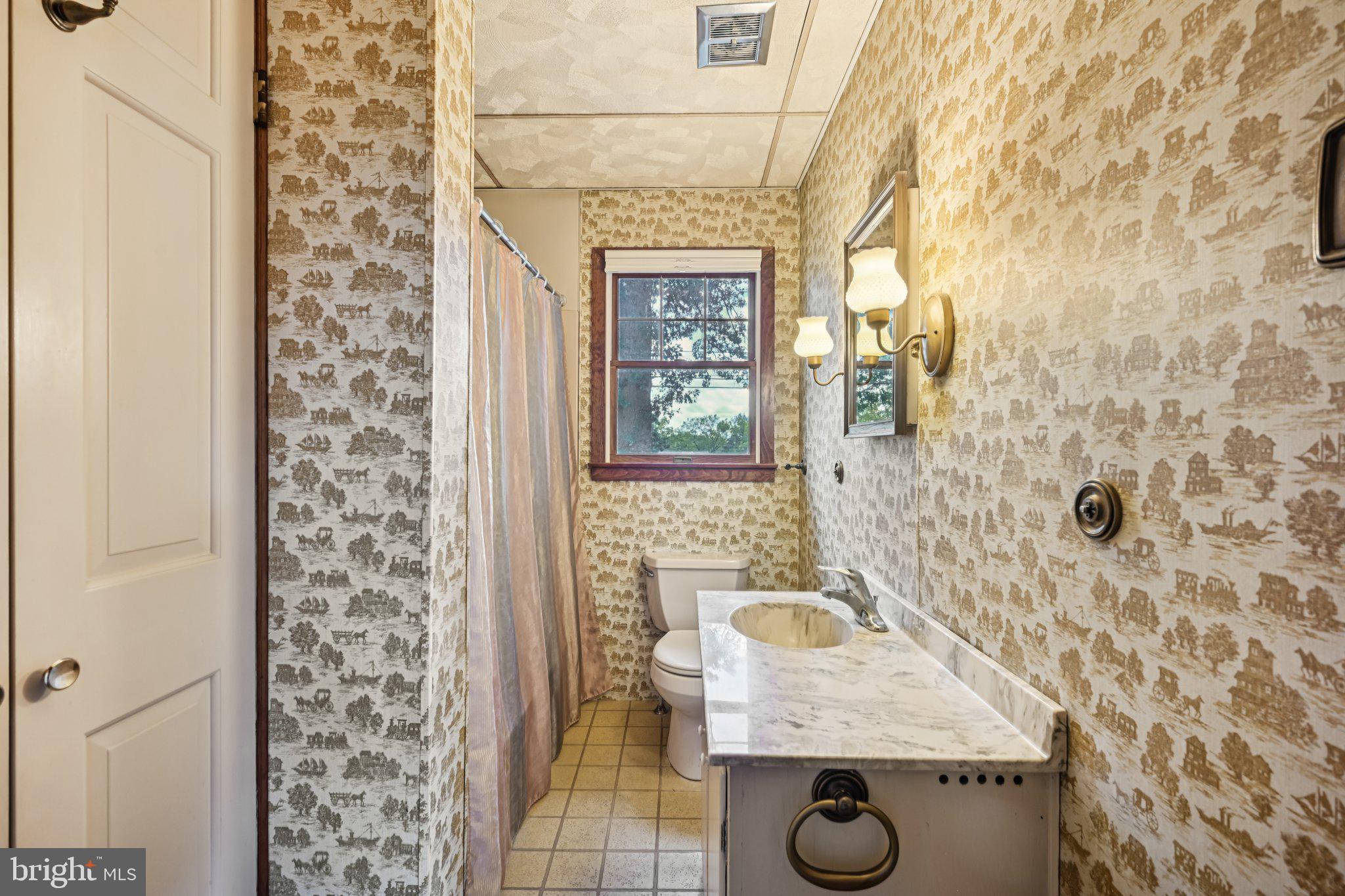 60 Brownback Road Royersford, PA 19468 - Photo 35 of 50 a bathroom with a granite countertop sink a mirror and shower