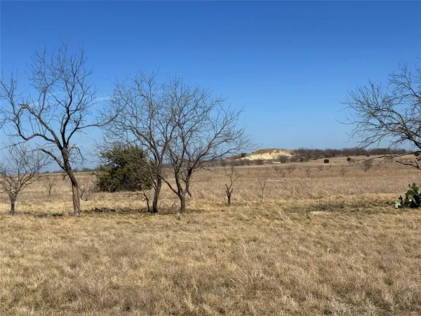 a view of snow on the road