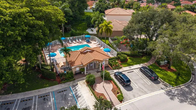 an aerial view of a house with outdoor space