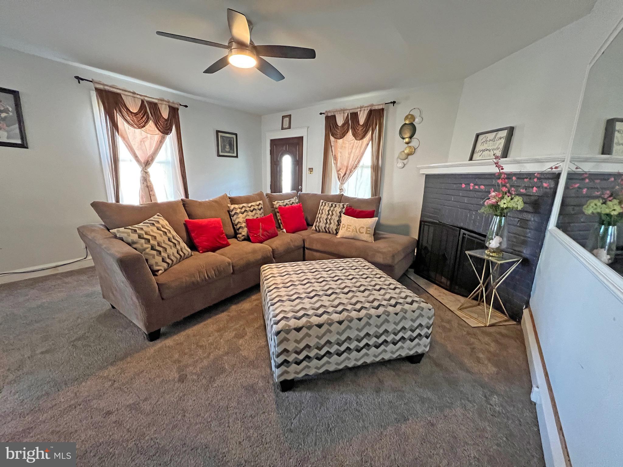 4129 Garrett Road Drexel Hill, PA 19026 - Photo 11 of 34 Living room with cozy wood burning fireplace