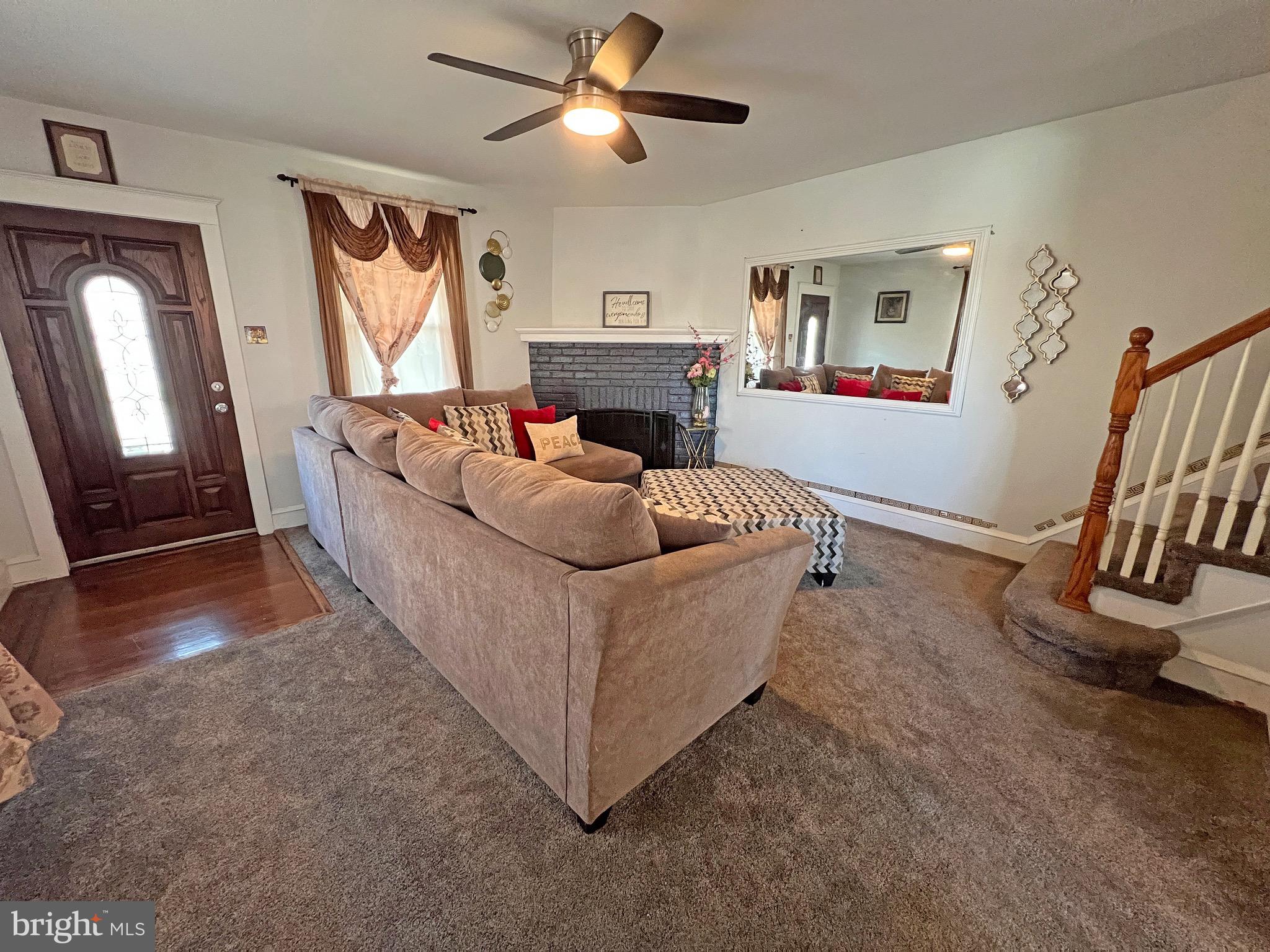 4129 Garrett Road Drexel Hill, PA 19026 - Photo 10 of 34 Living room with cozy wood burning fireplace