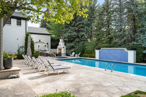 a view of a street with a cars park side of a road