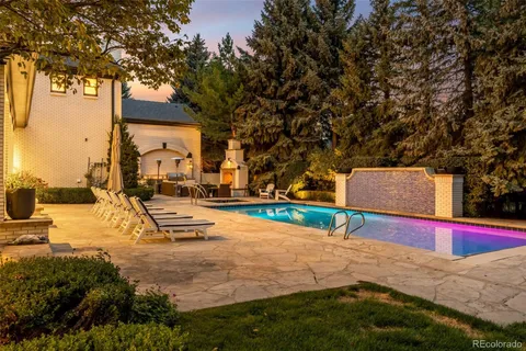 a view of a swimming pool with a lounge chairs
