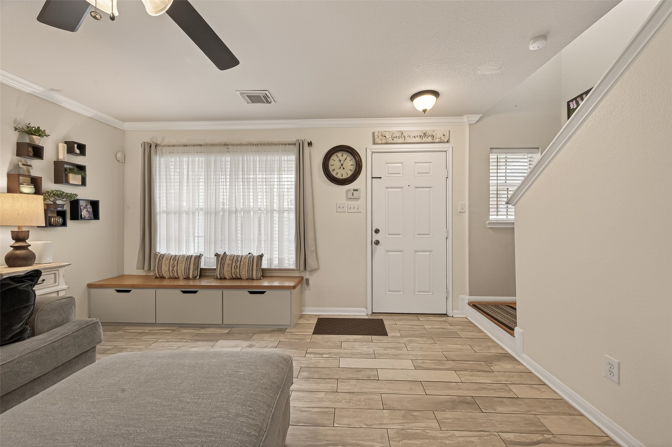 9902 Victoria Point Lane Houston, TX 77075 - Photo 3 of 35 This inviting front entryway greets you with warm natural light, stylish tile flooring, and charming details that set the perfect tone for a welcoming home.
