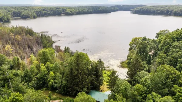 $599,900 | 8370 Lake Of The Woods Road, Bellaire, MI 49615
