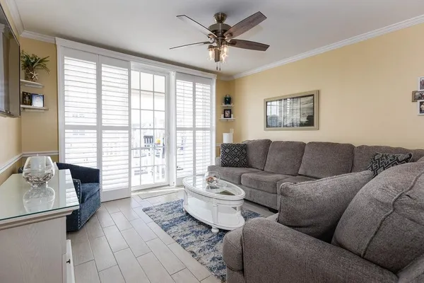 a living room with furniture and a window