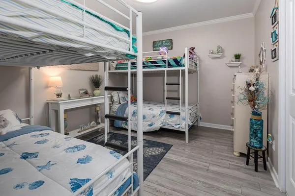 a bed room with a bed and a table