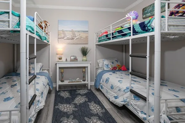a bed room with a bed and a window