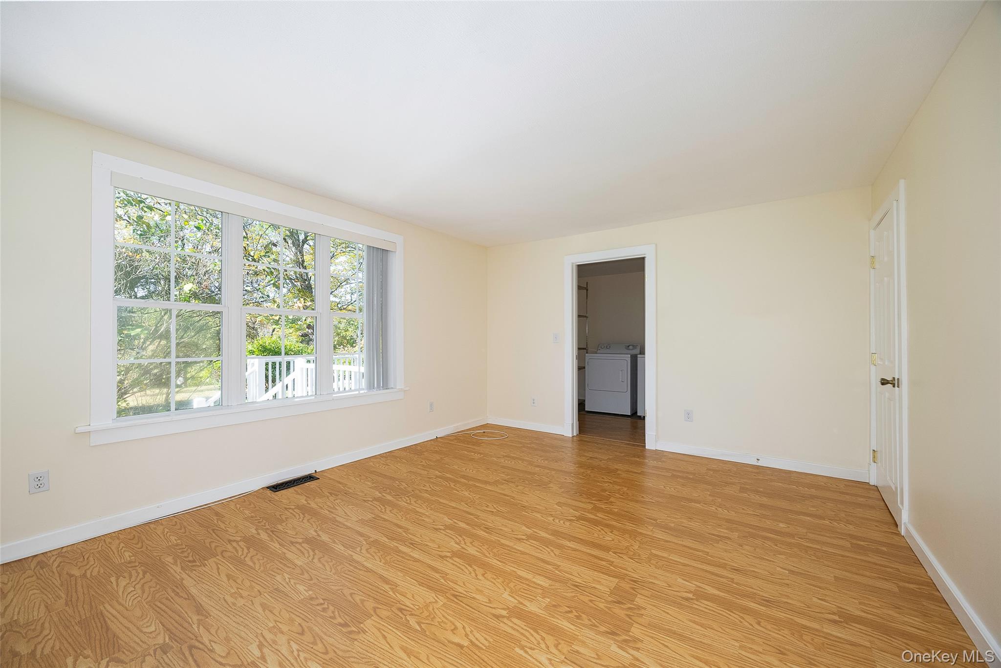 2 Haggerty Hill Road Rhinebeck, NY 12572 - Photo 19 of 47 Empty room featuring light wood-type flooring and washing machine and clothes dryer
