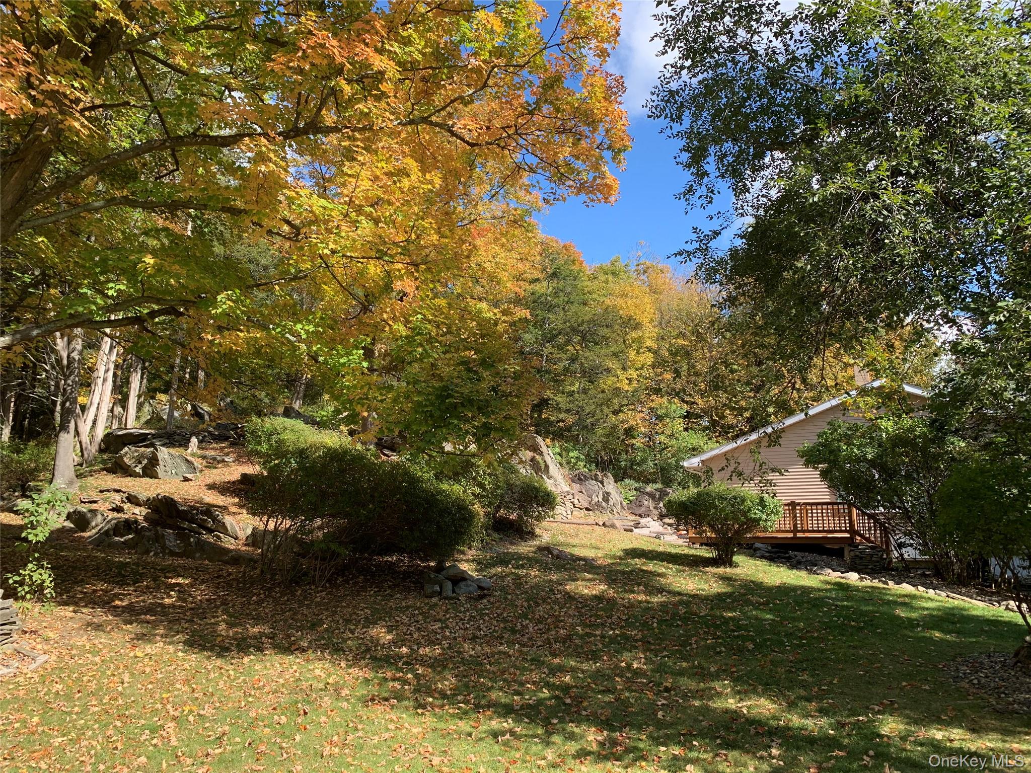2 Haggerty Hill Road Rhinebeck, NY 12572 - Photo 39 of 47 View of grassy yard featuring a deck