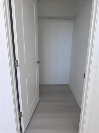 a bathroom with a toilet a sink and bathtub