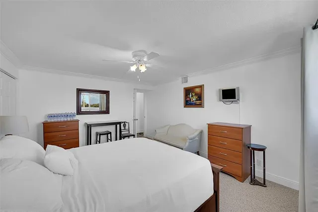 a bedroom with furniture and a bed