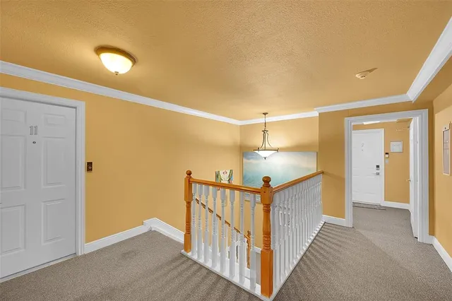 a view of a hallway with entryway