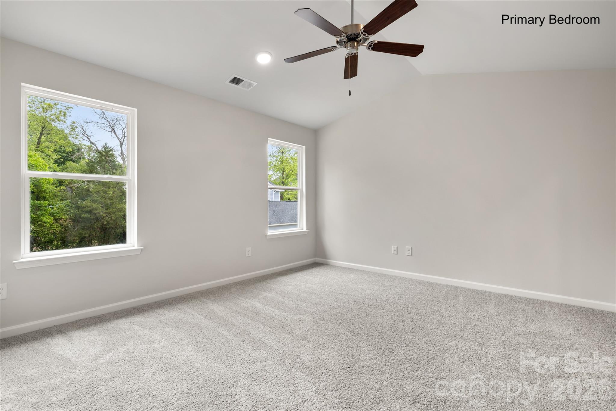 302 Elm Street Lancaster, SC 29720 - Photo 15 of 25 an empty room with windows and fan view