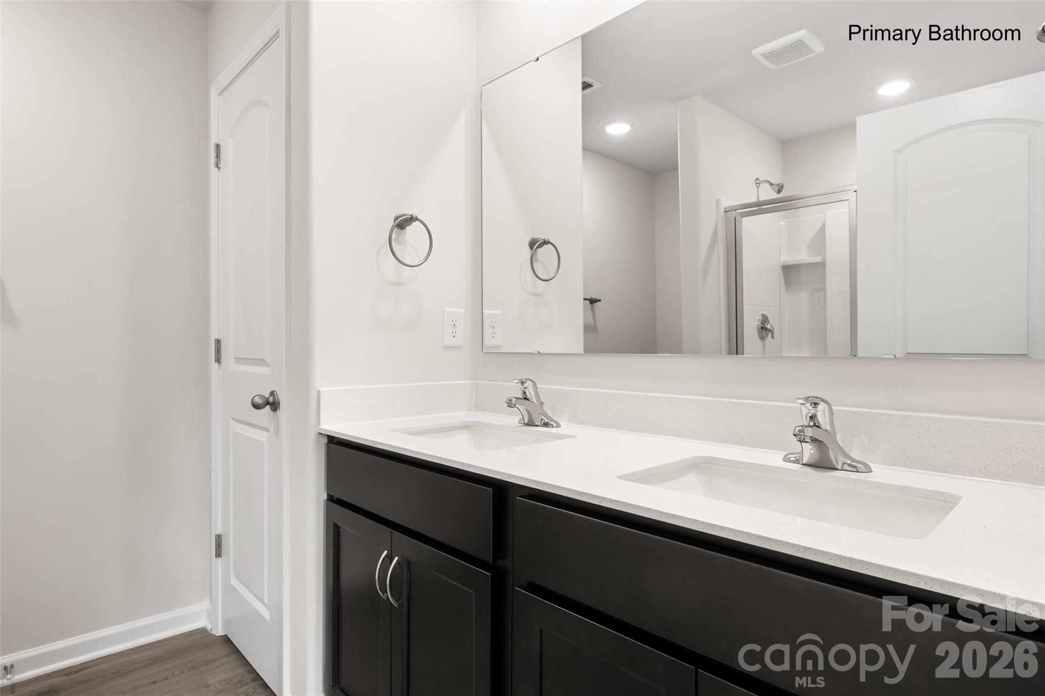 302 Elm Street Lancaster, SC 29720 - Photo 17 of 25 a bathroom with a sink double vanity and a mirror